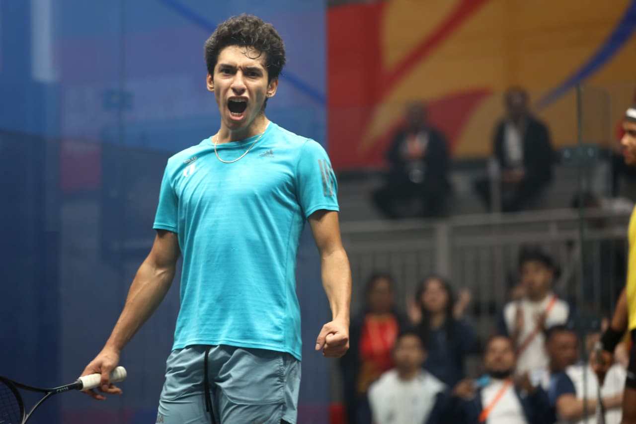 Junior Alejandro Enríquez celebrating squash victory.