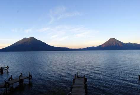 Custodiado por tres volcanes, el Lago de Atitlán ha sido calificado por miles de visitantes  como el más bello del mundo,  y por ser uno  de los principales atractivos naturales de Guatemala.