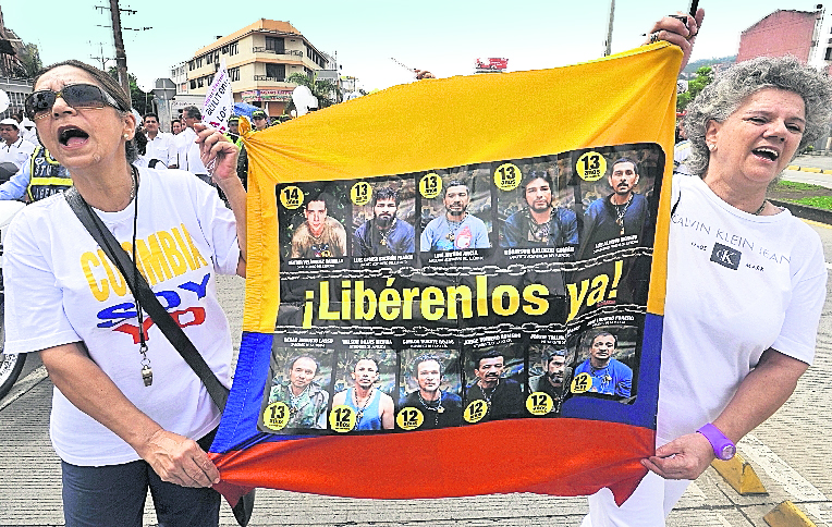 Gobierno colombiano y las FARC acordaron buscar a desaparecidos de la guerra. (Foto Prensa Libre: AP)