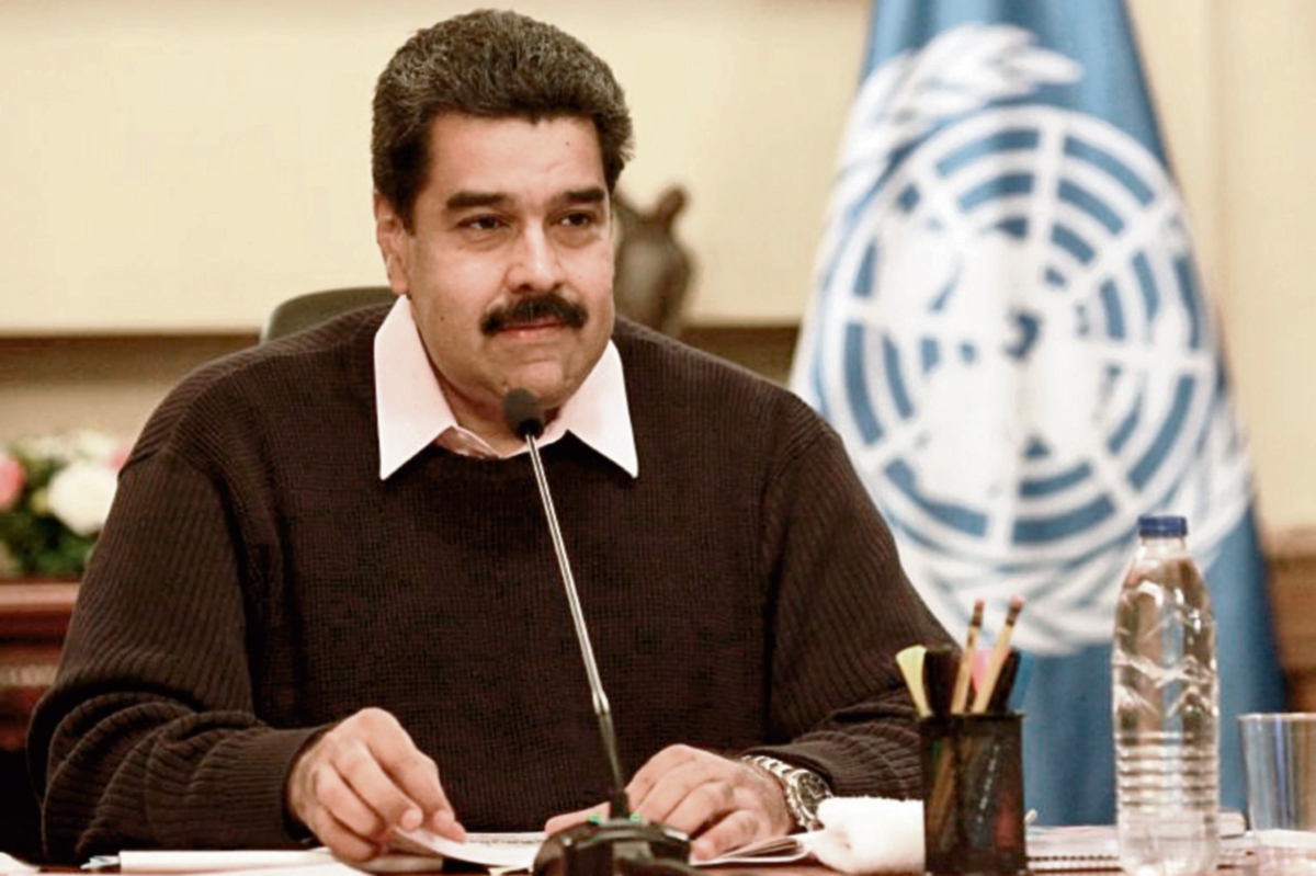 Nicolas maduro, presidente de Venezuela, acusó al sector empresarial de las alzas. (FOTO PRENSA LIBRE: EFE)