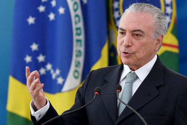 Michel Temer niega señalamientos que lo vincula en escándalo de corrupción. (Foto Prensa Libre: AFP)