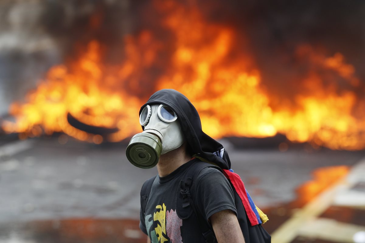 La crisis y las protestas en Venezuela cumplen ya un mes. (Foto Prensa Libre: AP)