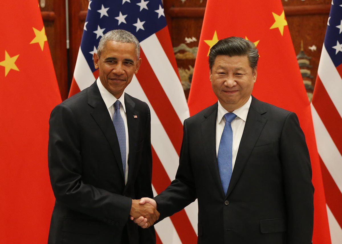 El presidente de EE. UU., Barack Obama, junto a su homólogo de China, Xi Jinping, en el comienzo de la reunión del G20. (Foto Prensa Libre: AFP).