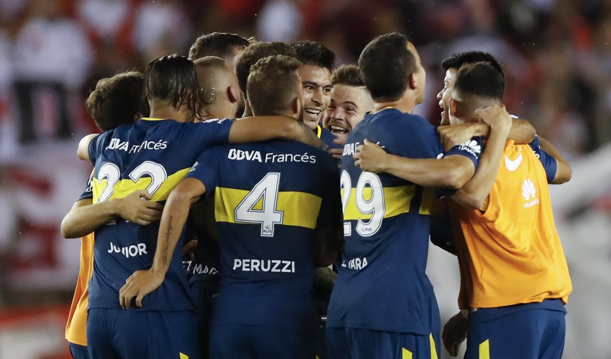 Los jugadores de Boca explotaron en júbilo ante un Monumental incrédulo. (Foto Prensa Libre: EFE)