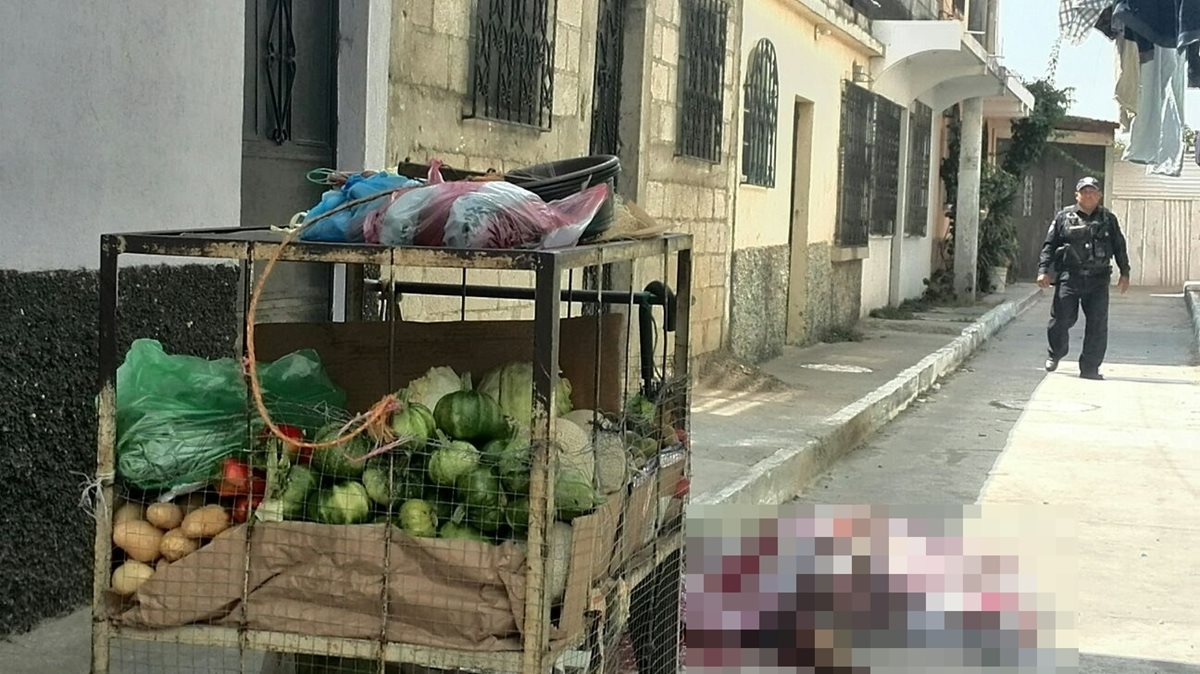 Una mujer murió luego de un ataque armado en la zona 12 de Villa Nueva. (Foto Prensa Libre: Estuardo Paredes)