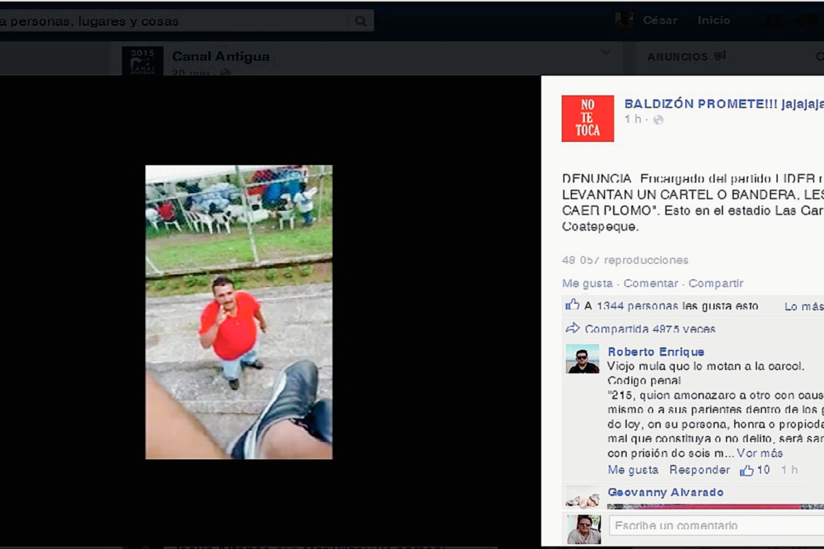 Un hombre vestido de rojo amenaza a opositores de Manuel Baldizón, en Coatepeque, Quetzaltenango. (Foto Prensa Libre: Hemeroteca PL)