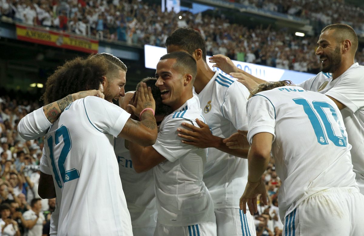 Los jugadores del Real Madrid celebran el gol anotado por Asencio al inicio del partido.