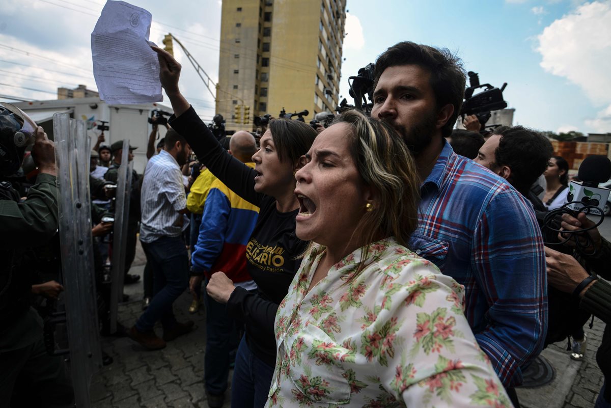 Opositores al gobierno de Venezuela participan en protestas. (Foto AFP)