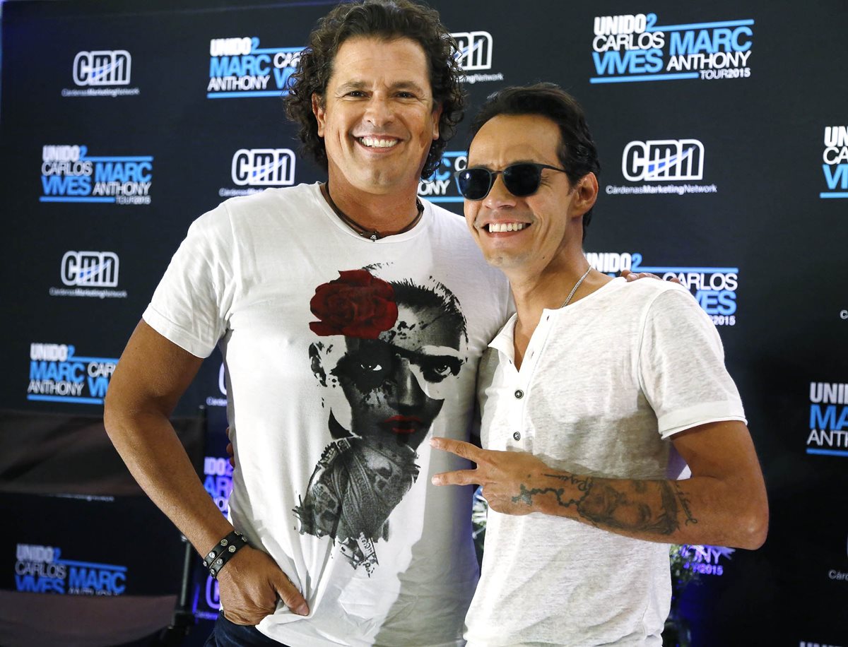 Carlos Vives y Marc Anthony durante una conferencia de prensa en Miami. (Foto Prensa Libre: AP)