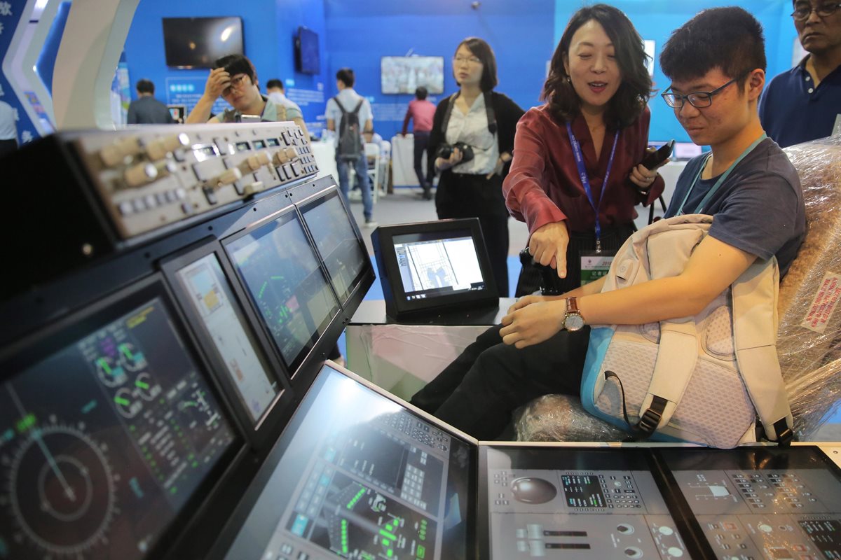 Imagen de la Feria Internacional de Tecnología de Pekín. (Foto Prensa Libre: EFE)