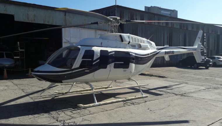El helicóptero vinculado con Manuel Baldizón y hallado por el MP era rojo y entró a Guatemala procedente de Nicaragua. (Foto Prensa Libre: MP)