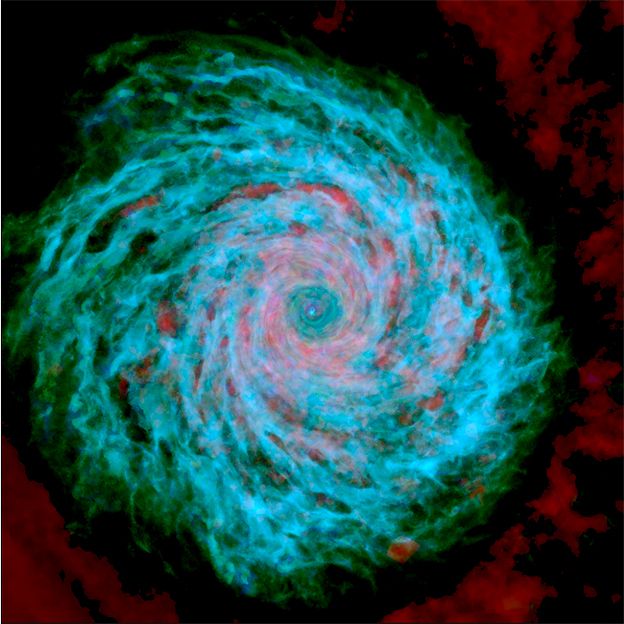 "Estas imágenes me gustan porque son hermosas", nos dijo Grand al mandarlas. "Ésta muestra la estructura del disco de gas en detalle, y está coloreada de acuerdo a la temperatura del gas: azul es frío, verde es cálido y rojo es caliente". (HITS).