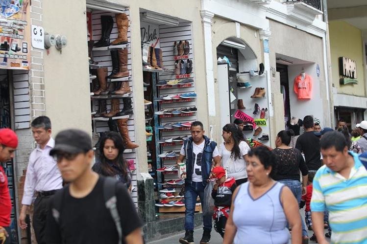 El comportamiento de la economía en el país se percibe de diferente forma en la población. (Foto, Prensa Libre: Hemeroteca PL).