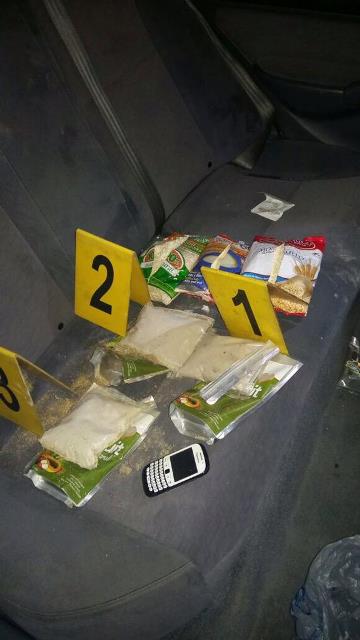 Los investigadores encontraron la heroína ocultan en empaques de cereales. (Foto Prensa Libre: PNC)