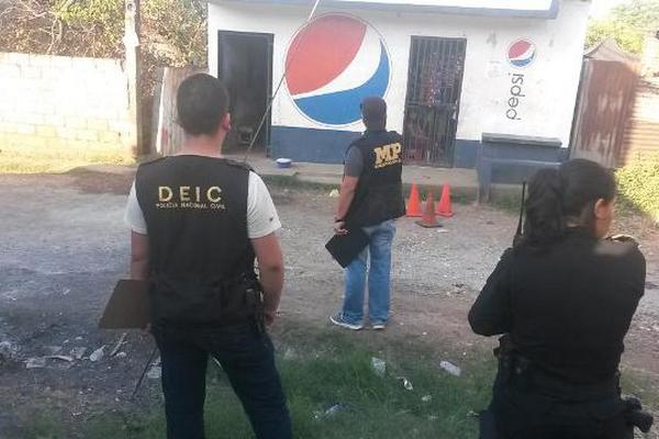 Mujer muere baleada en la zona tres de Escuintla. (Foto Prensa Libre: Carlos Paredes).