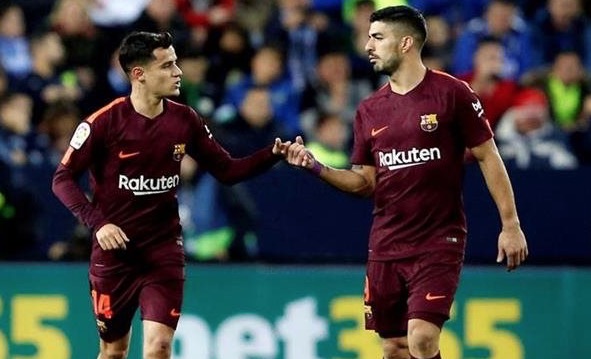 El Barcelona superó sin problemas al Málaga con goles de Suárez y Coutinho. (Foto Prensa Libre: AFP)