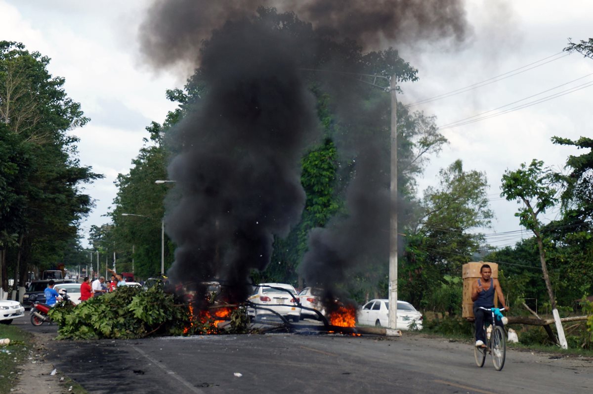 Las protestas continúan en Honduras. (Foto Prensa Libre: AFP)