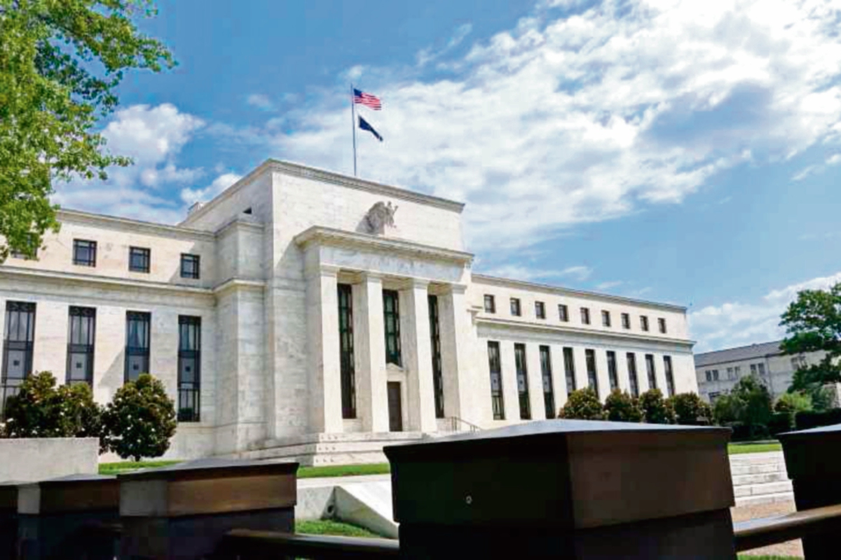 Comportamiento de la economía podría propiciar aumento de tasas de interés, según la Fed. (Foto Prensa Libre: AFP )
