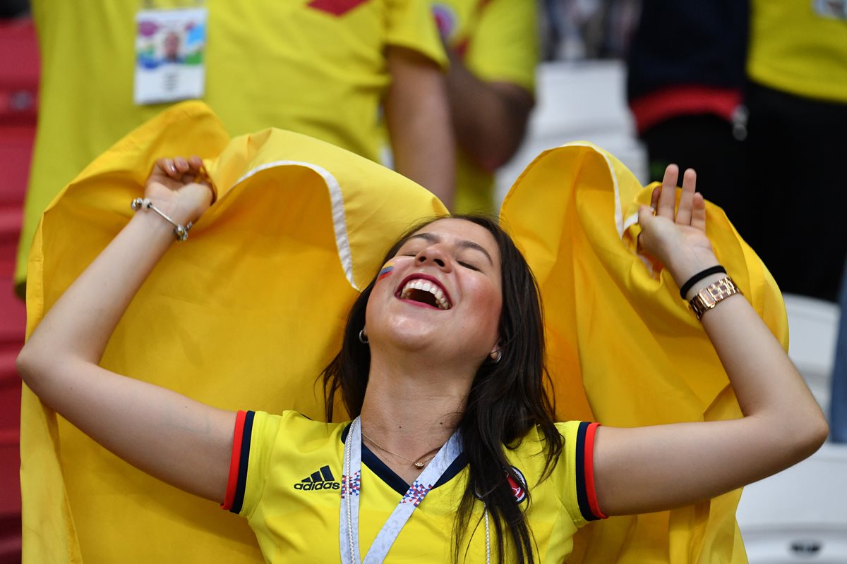 Las aficionadas colombianas celebraron la victoria de su selección contra Polonia.