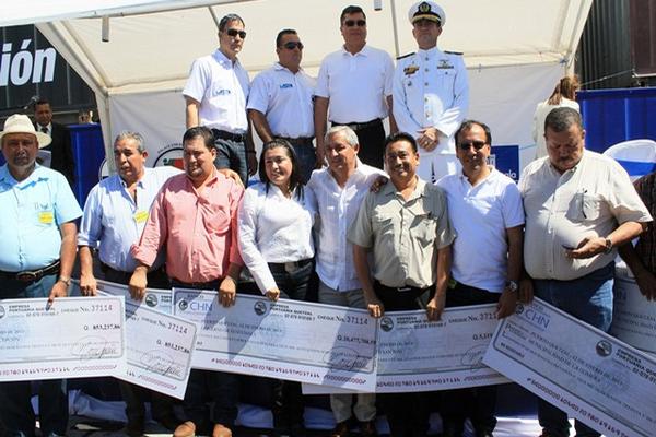 El gobernante estuvo presente en la entrega de las utilidades de la Portuaria Quetzal, en Escuintla. (Foto Prensa Libre: Carlos Paredes)<br _mce_bogus="1"/>