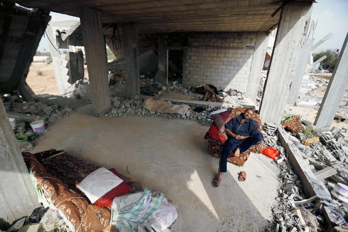 Escombros de una casa que fue destruida durante la guerra de Gaza de 50 días entre Israel y Hamás. (Foto Prensa Libre:AFP