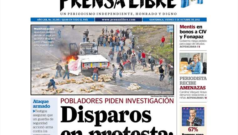 4/10/2012 Manifestantes queman camión desde el cual un guardia disparó.(Foto: Hemeroteca PL)