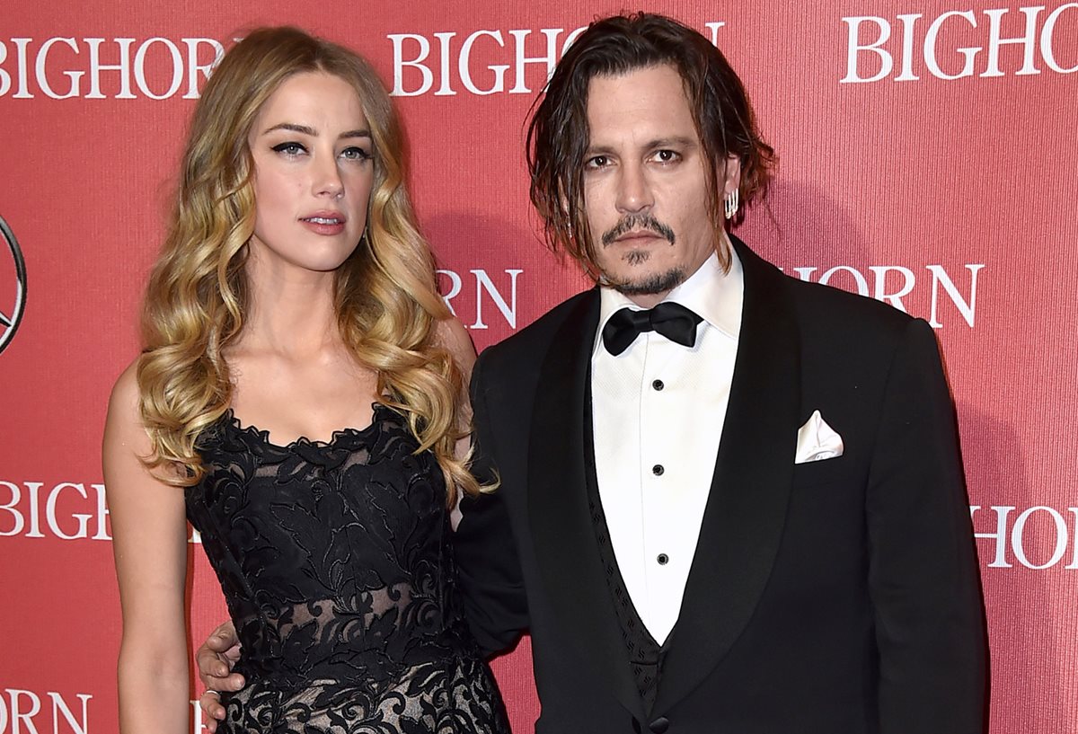Amber Heard y Johnny Depp hacen las pases para divorciarse. (Foto Prensa Libre: AP)