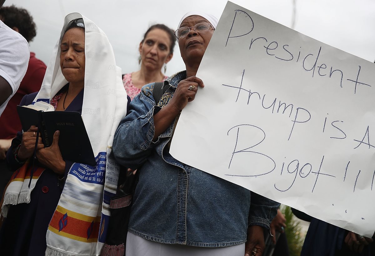 Los haitianos en Miami conmemoran el octavo aniversario del devastador terremoto y protesta por dichos de Trump.(Foto Prensa Libre:AFP).