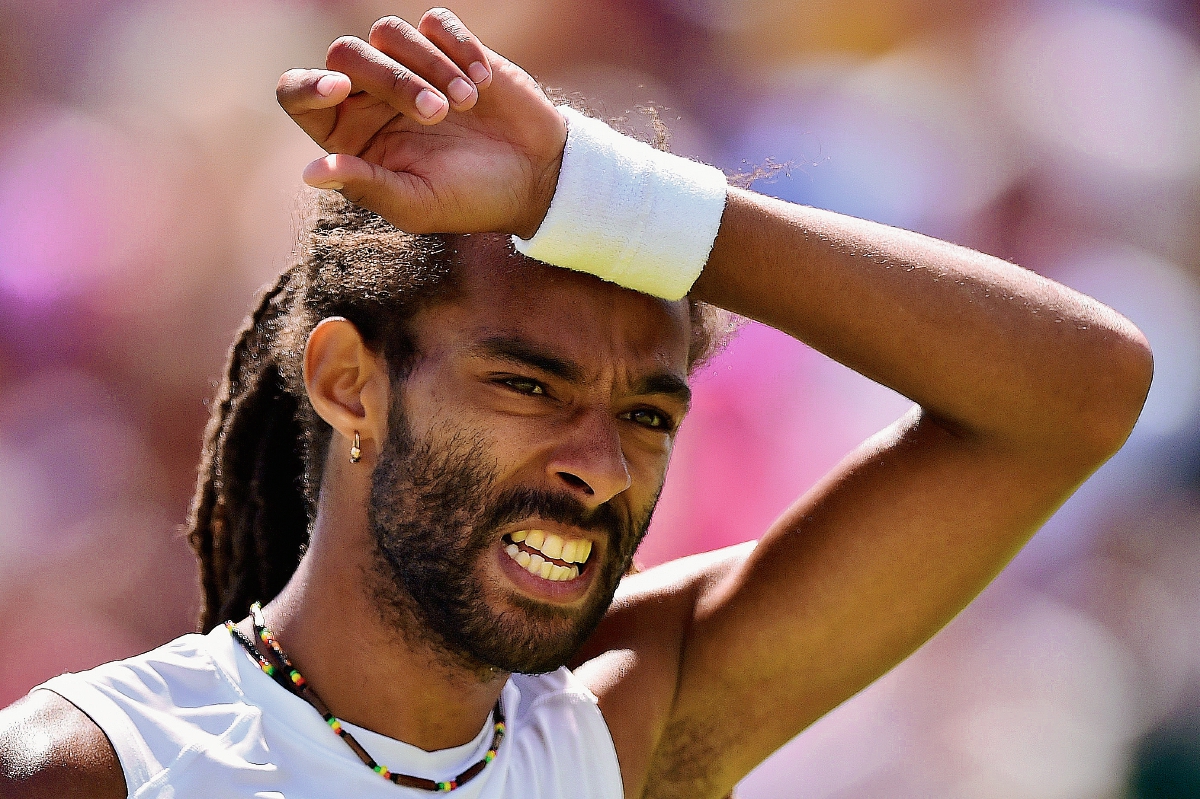 El tenista ”rasta” que eliminó a Nadal recibió hoy un sorbo de su propia medicina ante Troicki. (Foto Prensa Libre: AFP)