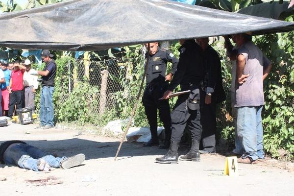 Un hombre de 26 años fue muerto a tiros en un sector de La Blanca, San Marcos. (Foto Prensa Libre: Alexander Coyoy)<br _mce_bogus="1"/>
