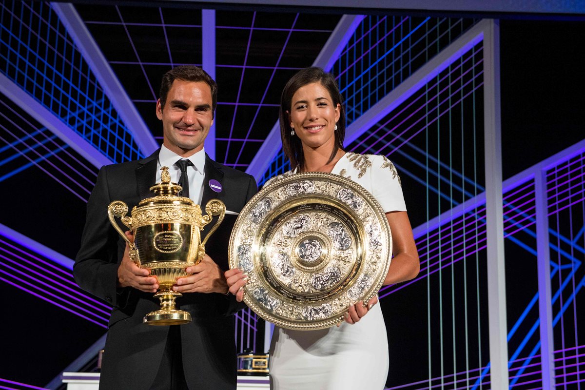 Los triunfos de Roger Federer y Garbiñe Muguruza fueron favorables para mejorar su posición en el ranking. (Foto Prensa Libre: AFP)