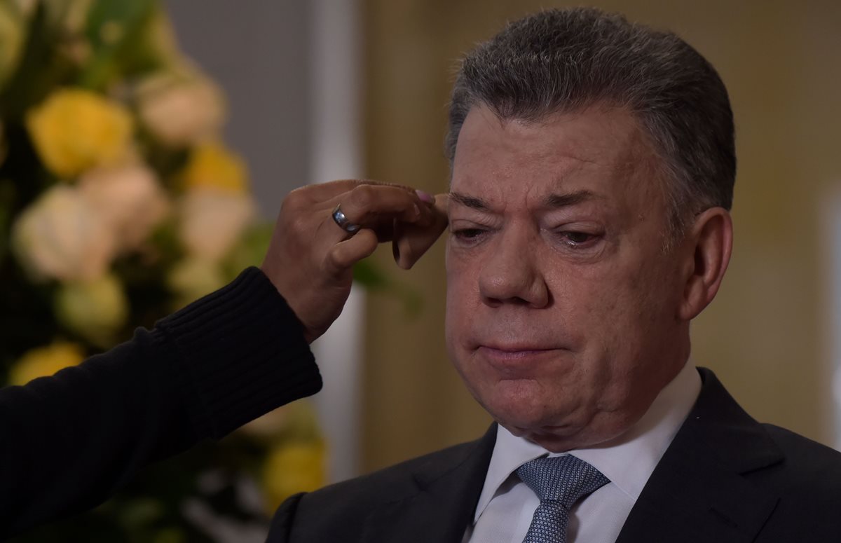 Con Santos, la economía colombiana tuvo un pico en 2011 del 6,6% para mantenerse en el 4% en 2012; pero luego el crecimiento se redujo hasta el 3,1% en 2015, un 2% en 2016 y en 2017 consiguió mantener una expansión más ligera, del 1,8%. (Foto Prensa Libre: AFP)