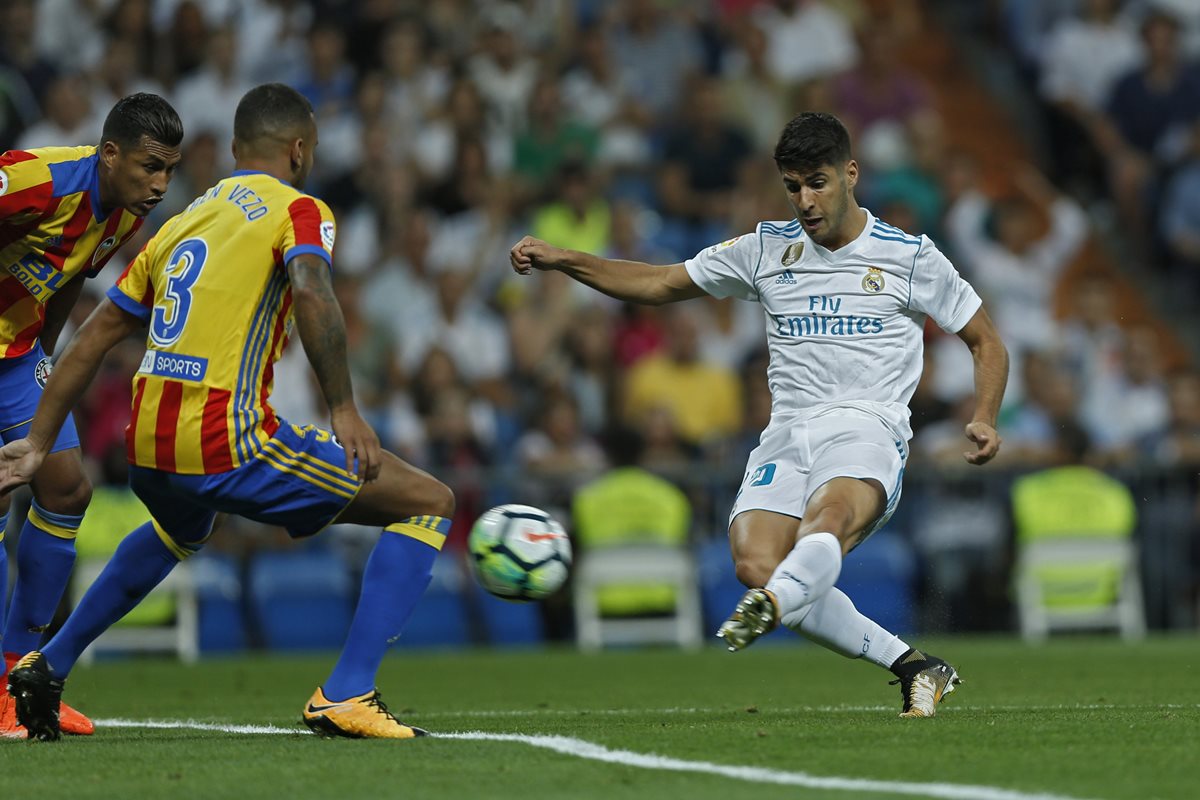Asensio se vistió de Cristiano y salvó un punto valioso para el Real Madrid. (Foto Prensa Libre: AP)