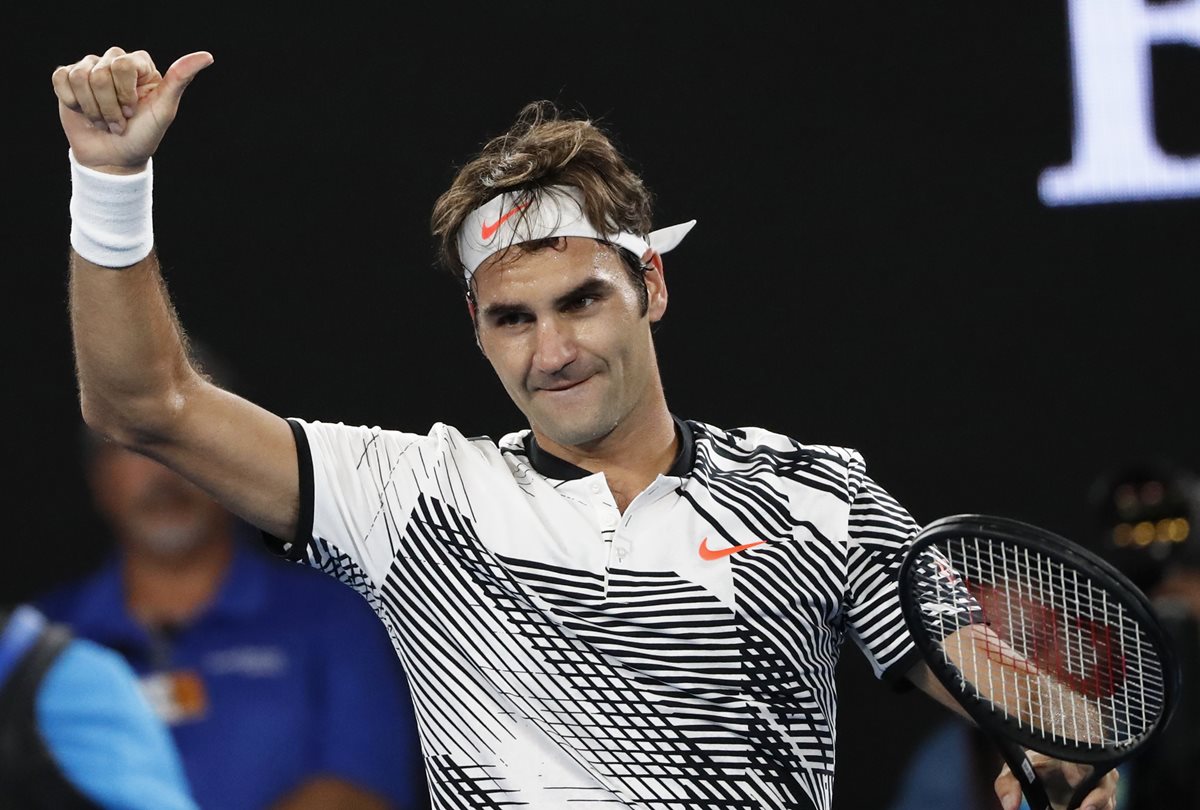 Federer celebra luego de superar a Nishikori en Australia. (Foto Prensa Libre: AP)