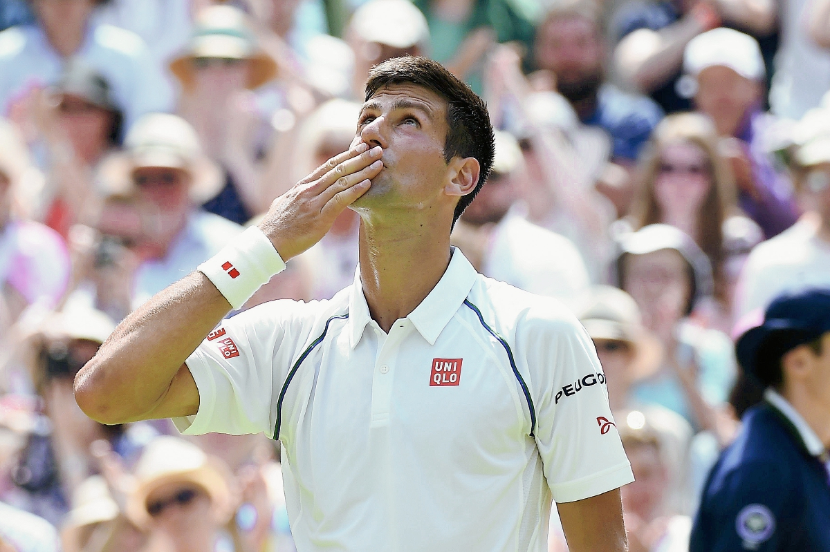 El tenista serbio Novak Djokovic celebra su victoria ante el finlandés Jarkko Nieminen. (Foto Prensa Libre: EFE)