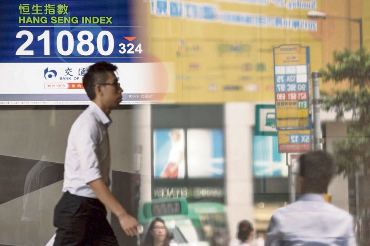 La caída de las bolsas de valores internacionales es efecto del menor crecimiento de la economía china, según analistas. (Foto Prensa Libre: EFE)