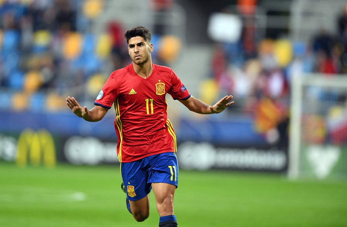 Asensio se lució con un show de goles en Polonia. (Foto Prensa Libre: AFP)