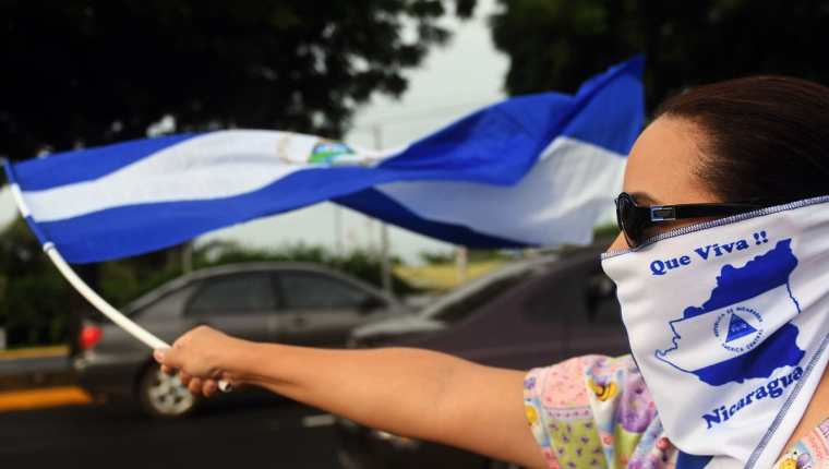 Opositores al gobierno de Ortega participan en una manifestación en Managua, Nicaragua. (AFP).