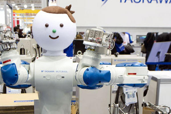 La empresa japonesa de fabricación de robots Yaskawa, presentó a su robot industrial 'Motoman', durante la exhibición internacional de Robots 2011, en Tokio. (Foto Prensa Libre: EFE)