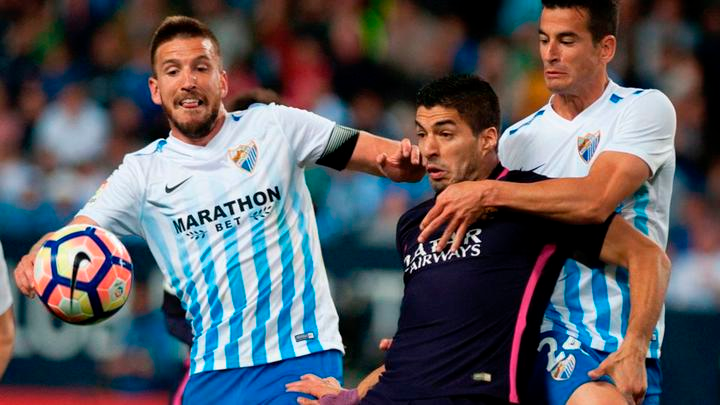 El Málaga quiere quedarse con el triunfo en casa frente a un Barcelona que no contará con Messi en el campo. (Foto Prensa Libre: AFP)