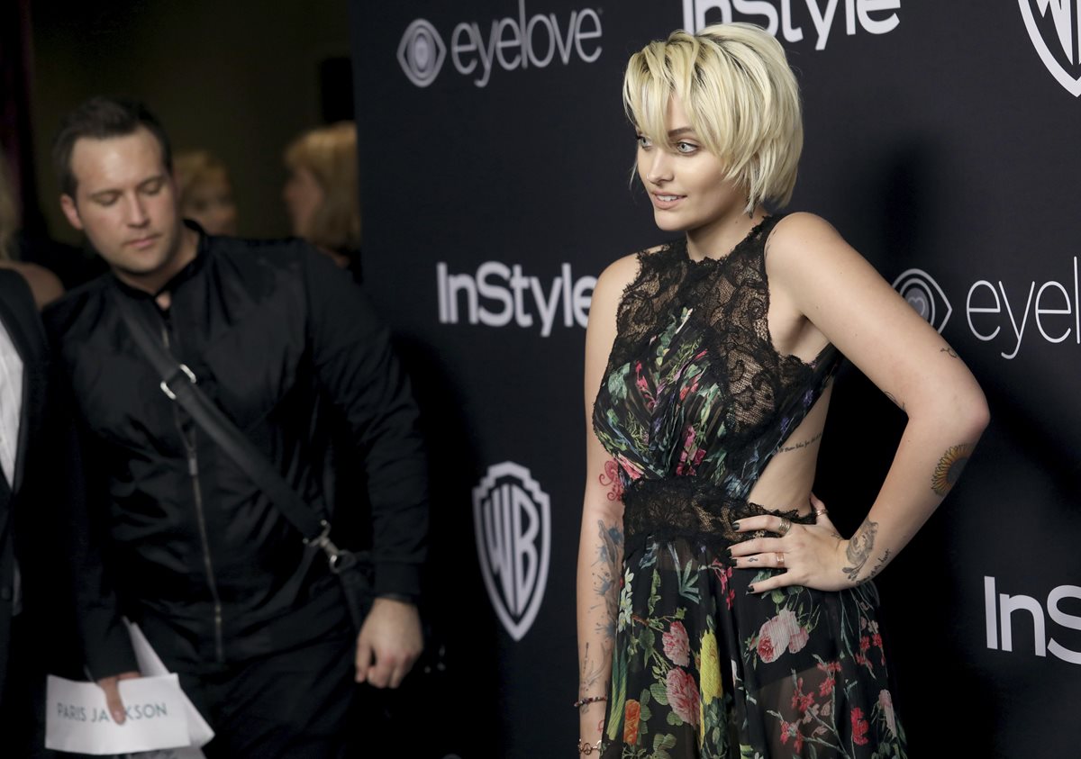 Paris Jackson es hija del príncipe del pop y Debbie Rowe, junto a su hermano Prince. (Foto Prensa Libre: AP)