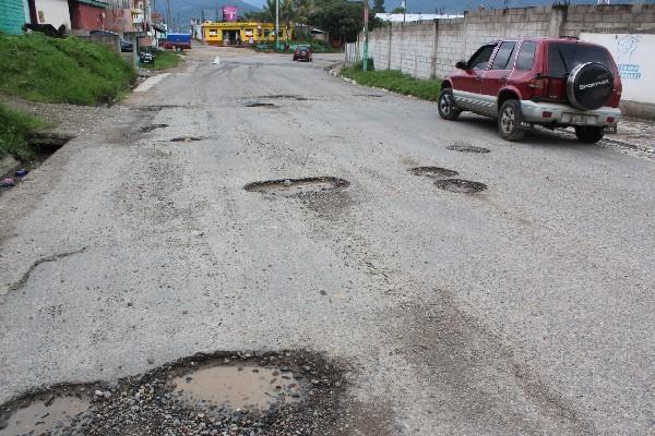 Vehículos se dañan por baches, dicen pilotos.