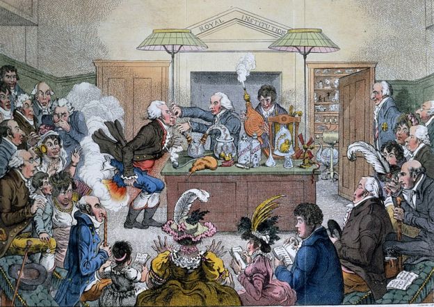 Demostración en la Royal Institution del gas de la risa que conduce a la pérdida de inhibiciones en la primera etapa de la anestesia. La caricatura se titula: "Investigaciones científicas. Nuevos descubrimientos en neumática, o una conferencia experimental sobre los poderes del aire". SCIENCE PHOTO LIBRARY