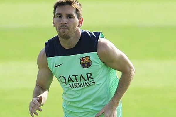 Lio Messi durante el entrenamiento del Barcelona, ayer. (Foto Prensa Libre: AFP)