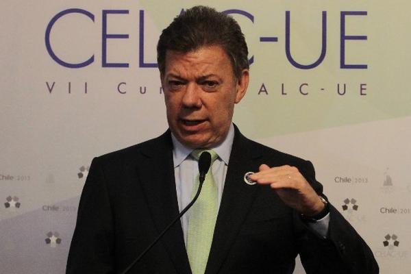 Juan Manuel Santos, presidente de Colombia, afirma que continuará su lucha contra la guerrilla. (Foto Prensa Libre: AFP)