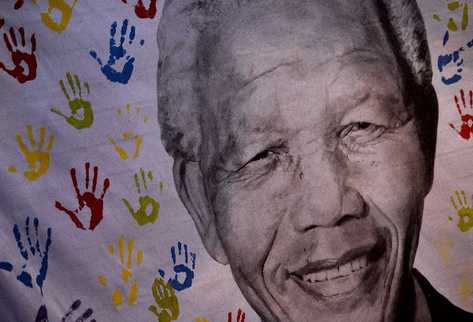 El secretario general de la ONU, Ban Ki-moon, calificó a Mandela como  gigante de nuestro tiempo . (Foto Prensa Libre: AFP)