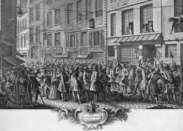 Ilustración de las escenas que se veían en la calle equivalente a Wall Street de París en el siglo XVIII, con gente peleándose por comprar acciones. GETTY IMAGES