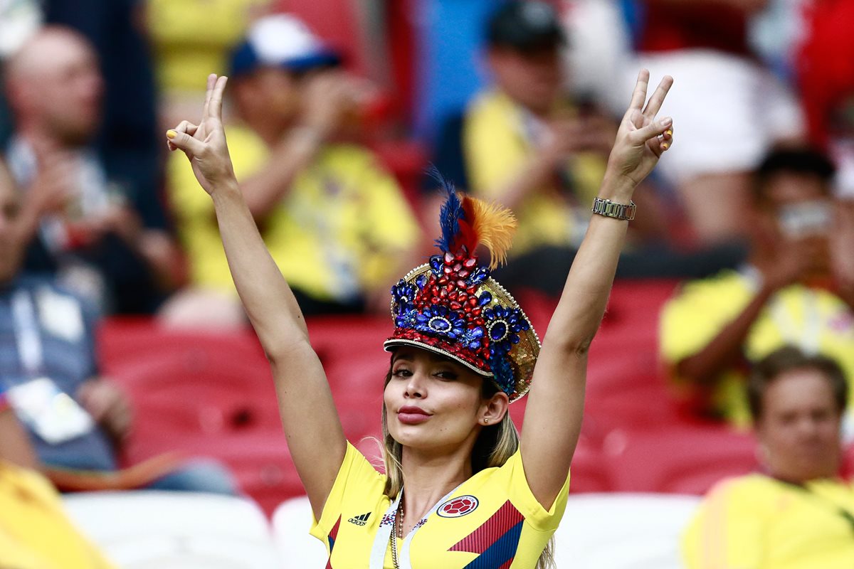 Las aficionadas colombianas celebraron la victoria de su selección contra Polonia.