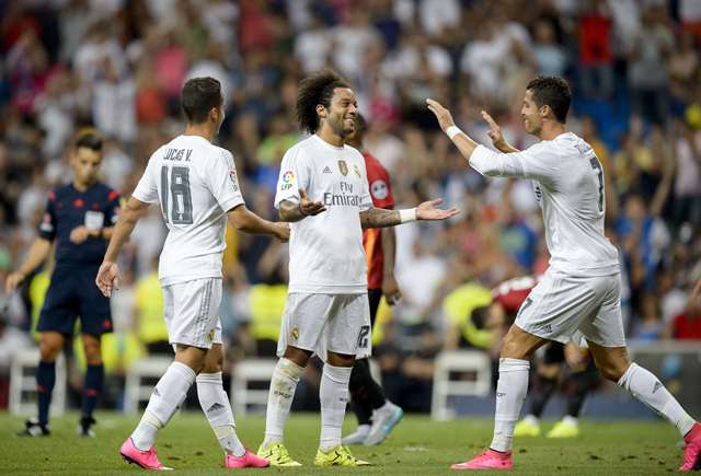 Marcelo festeja tras anotar el gol del triunfo para el Real Madrid. (Foto Prensa Libre: AFP)