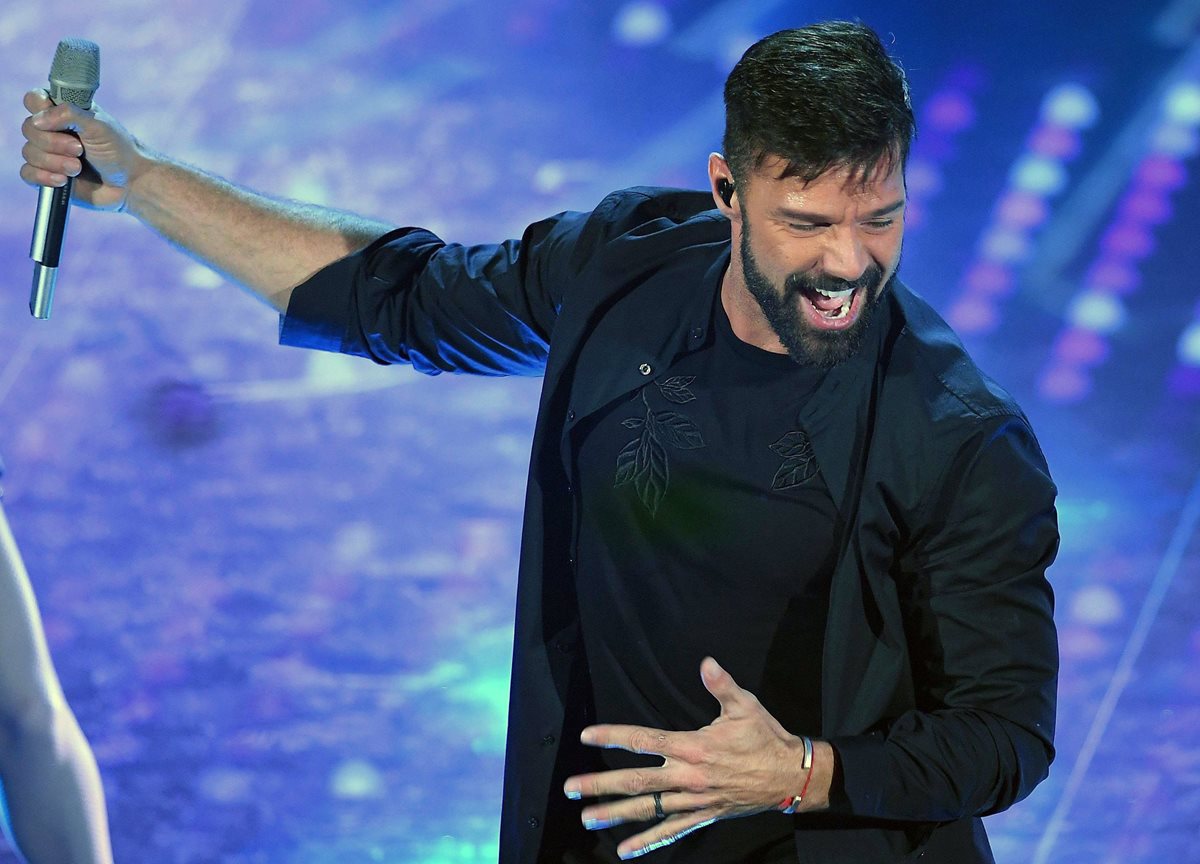 El puertorriqueño Ricky Martin deleitó al público en el festival de San Remo. (Fotos Prensa Libre, EFE)